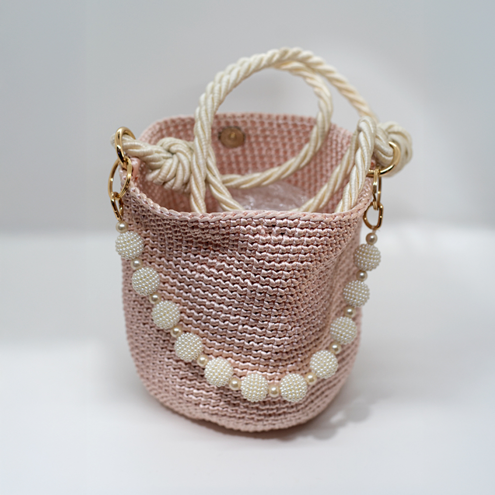 Mochila macramé rosado