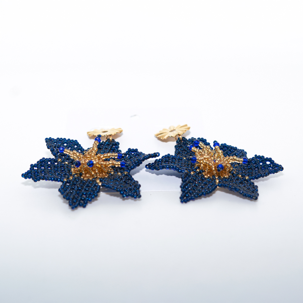 Aretes mostacilla flor azul